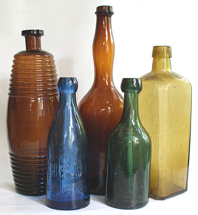 A GROUP OF BITTERS AND BEER BOTTLES