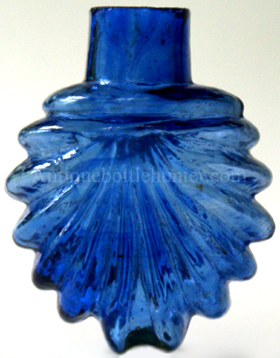 Scallop shell brillant blue smelling bottle or scent. Height, 2 - 1/4 in. Width, 1 - 3/4 in. --- AntiqueBottleHunter.com