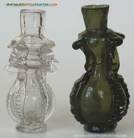 A pair of early bulbous scents, colorless and olive green --- AntiqueBottleHunter.com