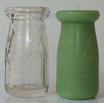 Candle ITEM# 1002 --- A clear CLOVERLAND FARMS DAIRY 1/4 pint milk bottle and candle. --- Burnable Bottles - AntiqueBottleHunter.com