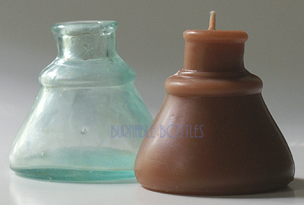 Candle ITEM# 1004 --- An aquamarine cone ink bottle and candle. --- Burnable Bottles - AntiqueBottleHunter.com