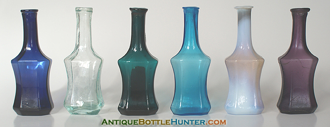 A run of corset type colognes in many colors --- AntiqueBottleHunter.com