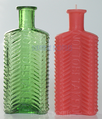 Candle ITEM# 1001 --- A yellow green KU-21 Crescent NOT TO BE TAKEN poison bottle and candle. --- Burnable Bottles - AntiqueBottleHunter.com