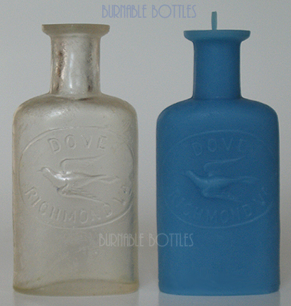 Candle ITEM# 1005 --- A colorless DOVE (embossed dove) RICHMOND, VA. bottle and candle. --- Burnable Bottles - AntiqueBottleHunter.com