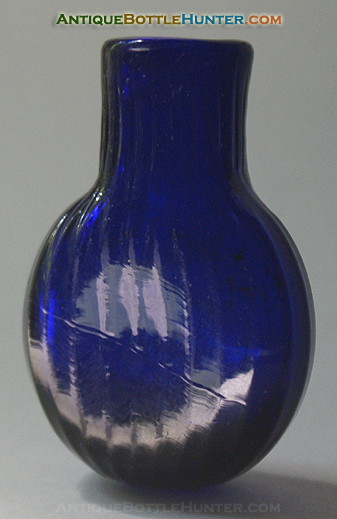 A deep cobalt blue pattern molded smelling bottle --- AntiqueBottleHunter.com