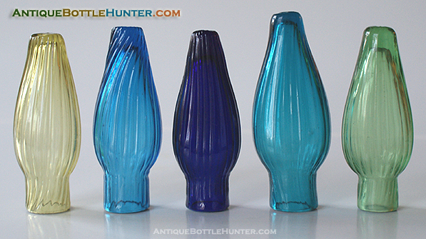 A colorful grouping of pattern molded scents in our collection. --- AntiqueBottleHunter.com