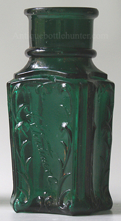 A rich emerald green fancy salts: A.A. VANTINE & CO. Height, 3 - 5/8 in. Width, 1 - 3/4 in. --- AntiqueBottleHunter.com