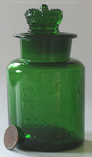 A much larger than normal CROWN PERFUMERY COMPANY bottle. --- AntiqueBottleHunter.com
