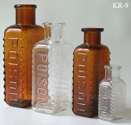 An amber (5 - 3/8 in.), clear (4 - 5/8 in.), amber (4 - 3/8 in.) and clear (2 - 5/8 in.) set of KR-9s --- AntiqueBottleHunter.com 